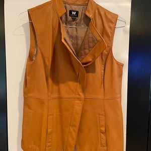 Never worn. New without tags.  Cognac Brown leather vest.  Great condition